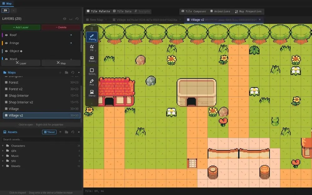 The Lune map editor with Village v2 open: layers, map list and tile tools beside a village of houses, paths and flowers.